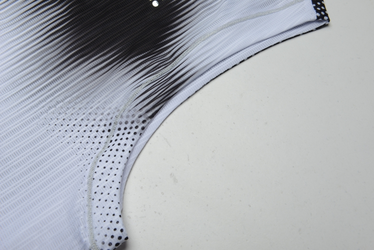 singlet armhole with smooth stitching and lightweight mesh texture